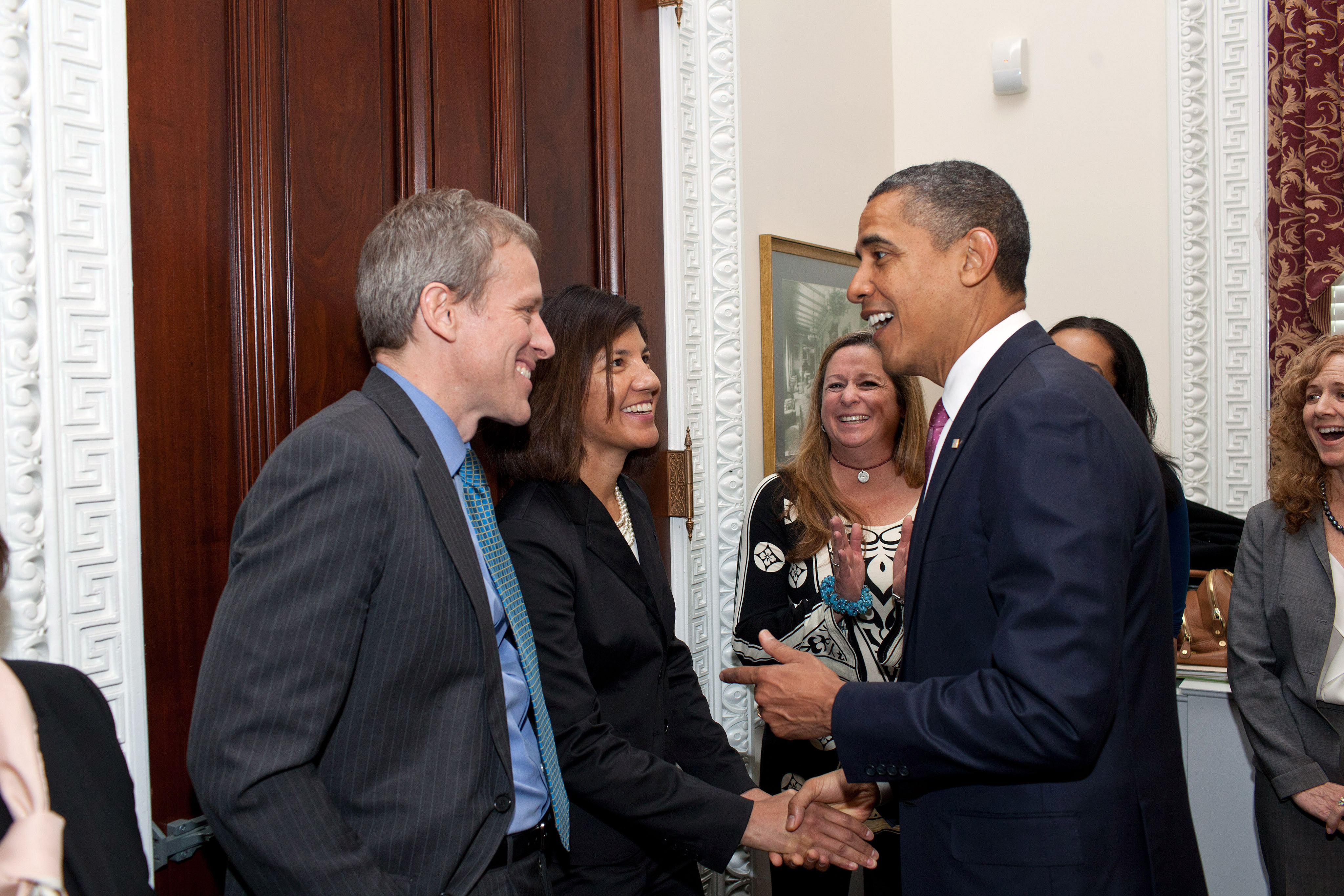 Whitney Tilson and Barack Obama.